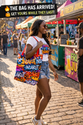 graffiti print large tote bag worn at outdoor market with street food stalls and urban lifestyle scene