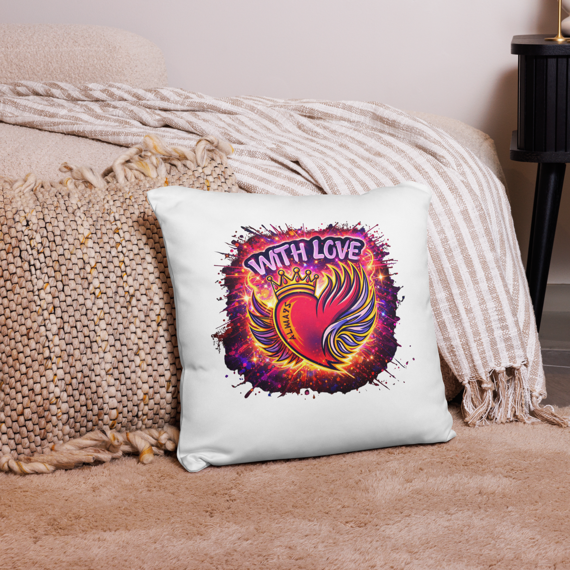 With Love Always throw pillow with heart and wings design on textured couch with knit blanket